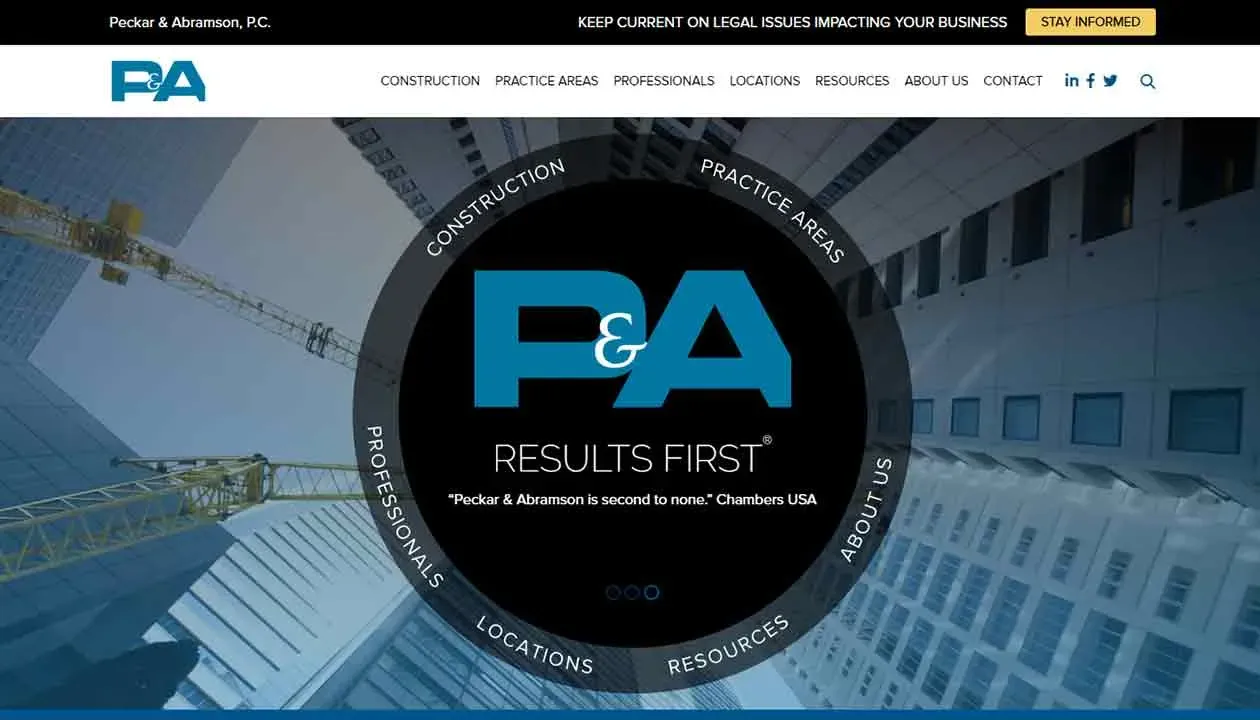 Homepage of Peckar & Abramson, featuring a construction theme with a crane, a circular menu, and navigation links for construction, practice areas, professionals, and resources.