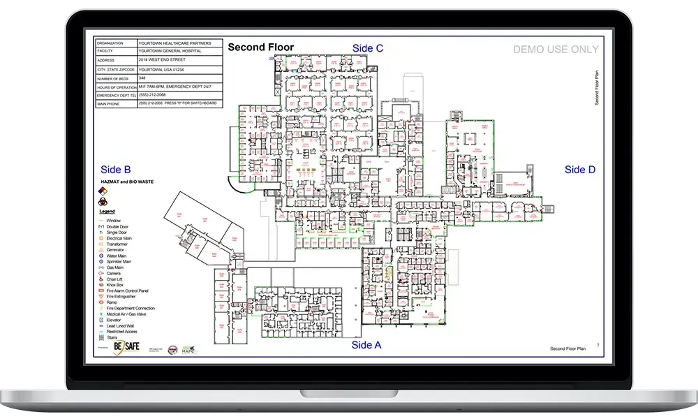 Esta imagen muestra un plano de planta detallado en la pantalla de una laptop, destacando la disposición de varias habitaciones, pasillos y secciones en el segundo piso, con lados etiquetados A, B, C y D como referencia.