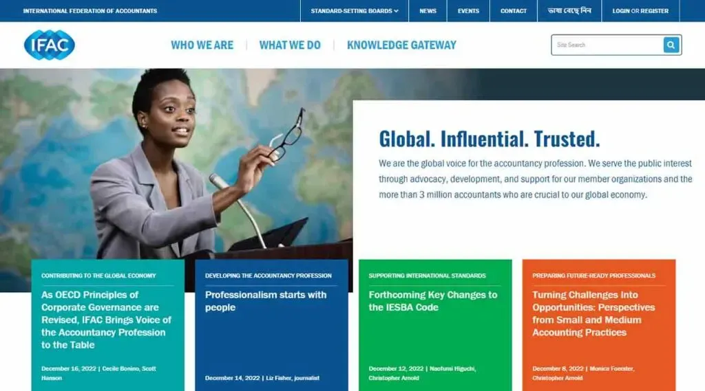 A professional individual stands at a lectern, speaking confidently in front of a backdrop featuring text about global influence and trust, representing the accountancy profession's dedication to advocacy, development, and support for organizations and accountants worldwide.