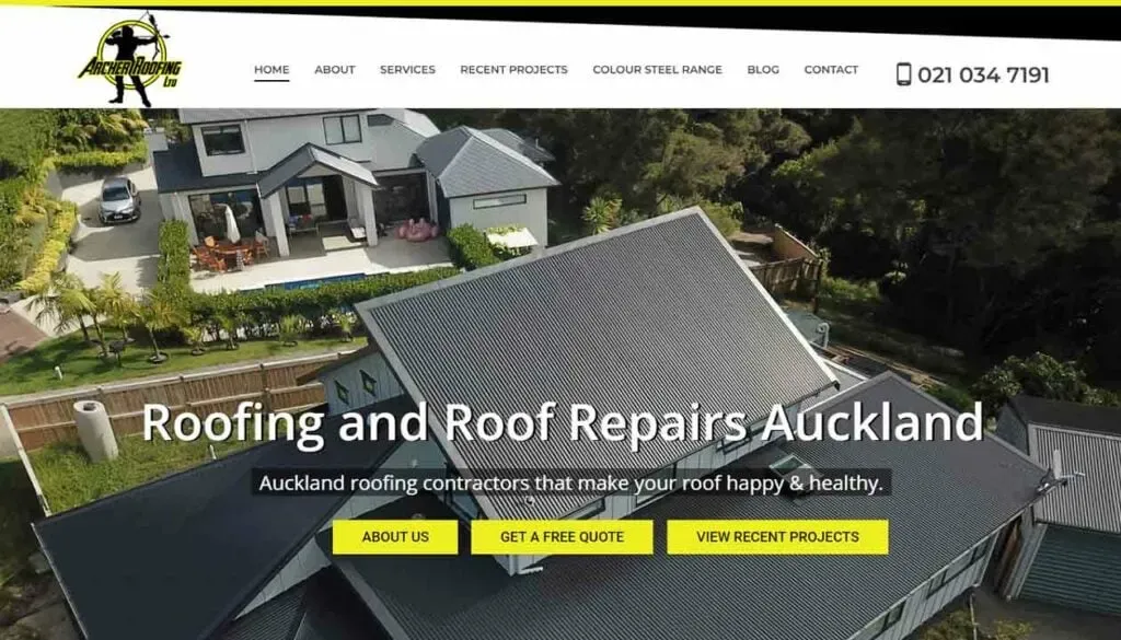 The image shows a professional website homepage for a roofing and roof repairs company in Auckland, featuring a large aerial view of modern homes with new and renovated roofs surrounded by lush greenery, emphasizing their roofing services and contact information.