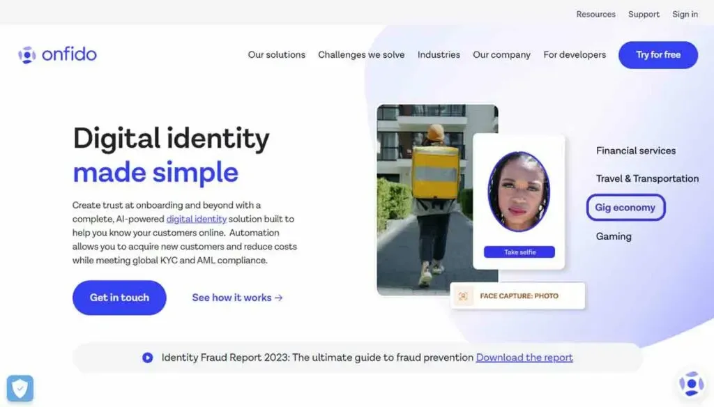 A website homepage featuring a digital identity verification service, showcasing a header with the slogan "Digital identity made simple," and including a call-to-action button labeled "Get in touch," alongside a sample profile image displayed on a mobile screen for identification purposes, with additional navigation options in the menu bar for various industries such as financial services and gig economy.