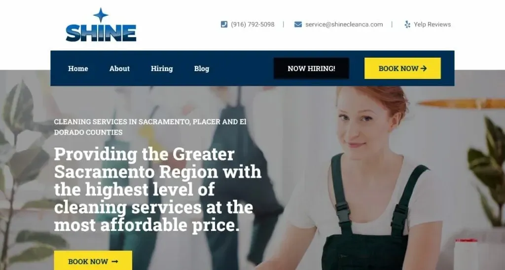A person in a blue apron is cleaning a table, with the Shine cleaning service website featuring a booking button and contact information for cleaning services in Sacramento, Placer, and El Dorado counties.