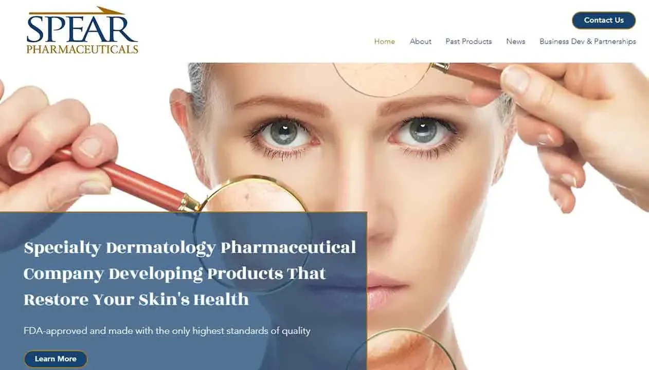 A woman closely examines her reflection with a magnifying glass on a webpage for Spear Pharmaceuticals, highlighting their focus on dermatological products aimed at restoring skin health.