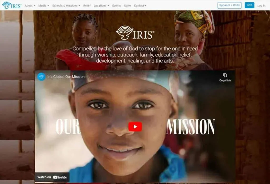 Two smiling children stand against a rustic background, with the title "Iris Global: Our Mission" displayed, emphasizing themes of worship, outreach, and education.