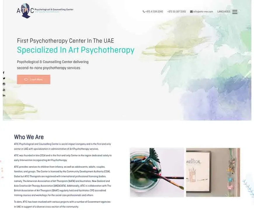 Website homepage of a psychological and counseling center, with a modern design and colorful abstract art elements, highlighting its specialization in art psychotherapy services, and contact information displayed at the top.