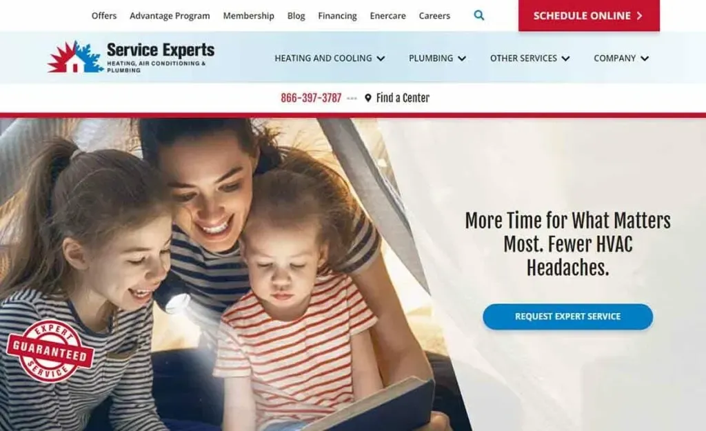 A smiling woman and two children sit together, reading and enjoying time indoors, highlighting a cozy family moment, with a focus on reliable HVAC services for home comfort.