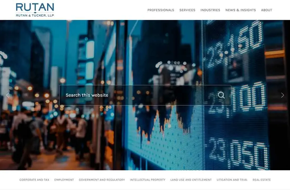 A bustling city street at night with blurred pedestrians, reflected in a large, bright digital stock ticker display featuring rapidly changing numbers, conveying a sense of urban energy and financial activity.