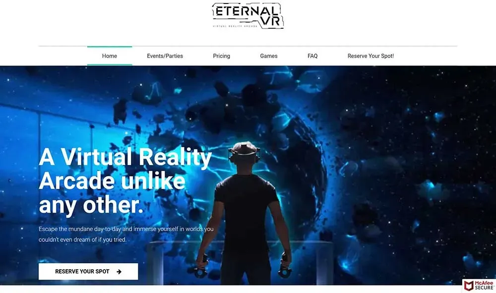 A person wearing a virtual reality headset stands in a dimly lit arcade, surrounded by glowing blue lights and abstract digital shapes, illustrating an immersive virtual reality experience.