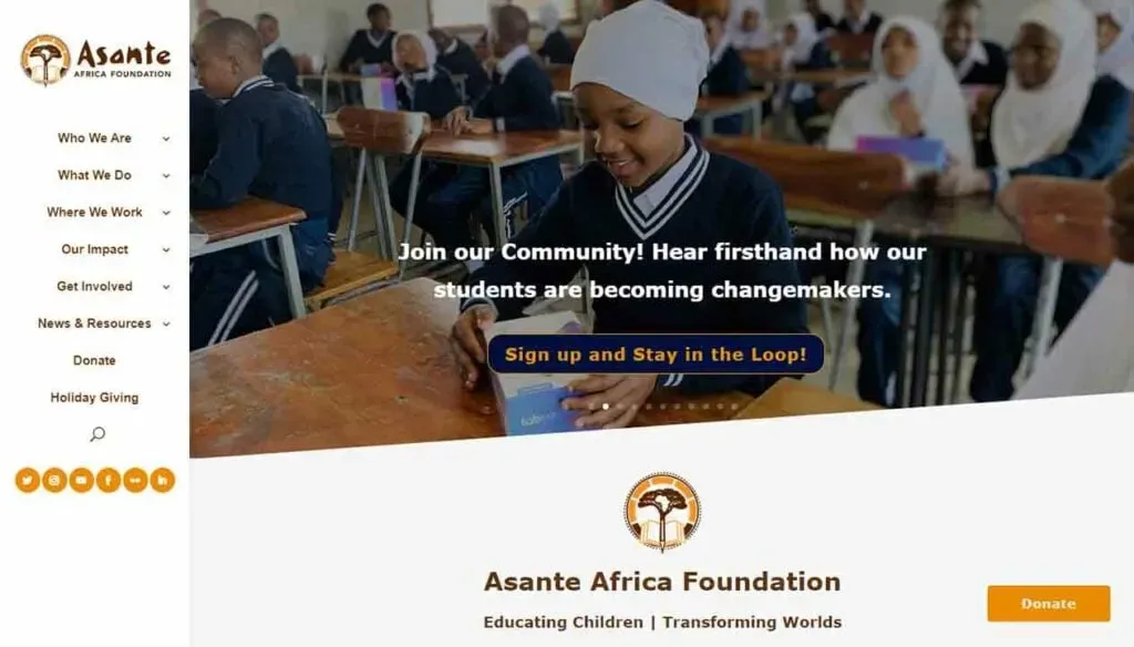 A classroom scene with students in uniform seated at desks, some actively engaging with educational materials, as the Asante Africa Foundation promotes community involvement and encourages people to sign up for updates.