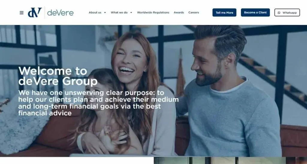 A smiling family sits together in a bright, modern living room, with the text "Welcome to deVere Group" and a message about helping clients achieve financial goals, overlaid on the image.