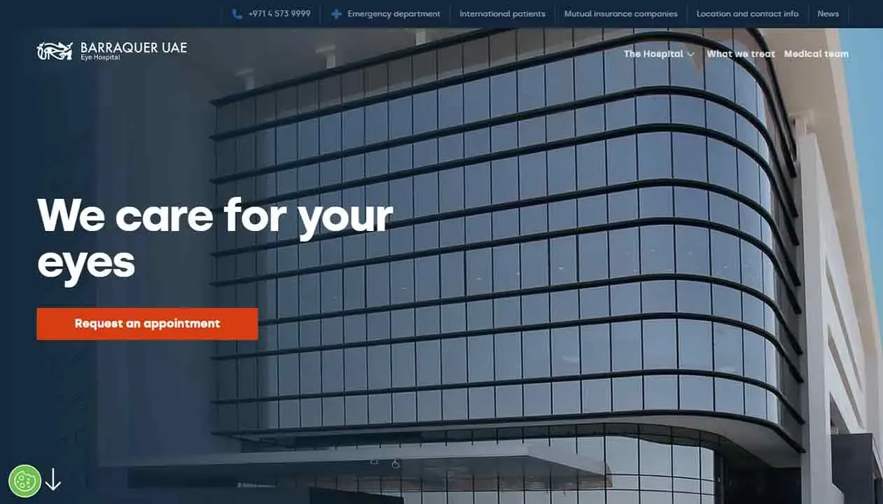 The image depicts a modern building with a sleek, curved glass facade, prominently featuring the text "We care for your eyes" alongside a red "Request an appointment" button, suggesting a focus on eye care services at the hospital.