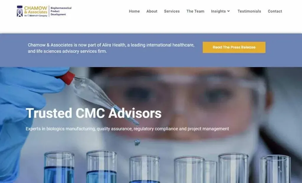 The image shows a laboratory setting with focus on a scientist using a pipette to transfer liquid into test tubes, highlighting themes of biologics manufacturing and quality assurance, with a banner mentioning Chamow & Associates, a company in healthcare and life sciences advisory services.