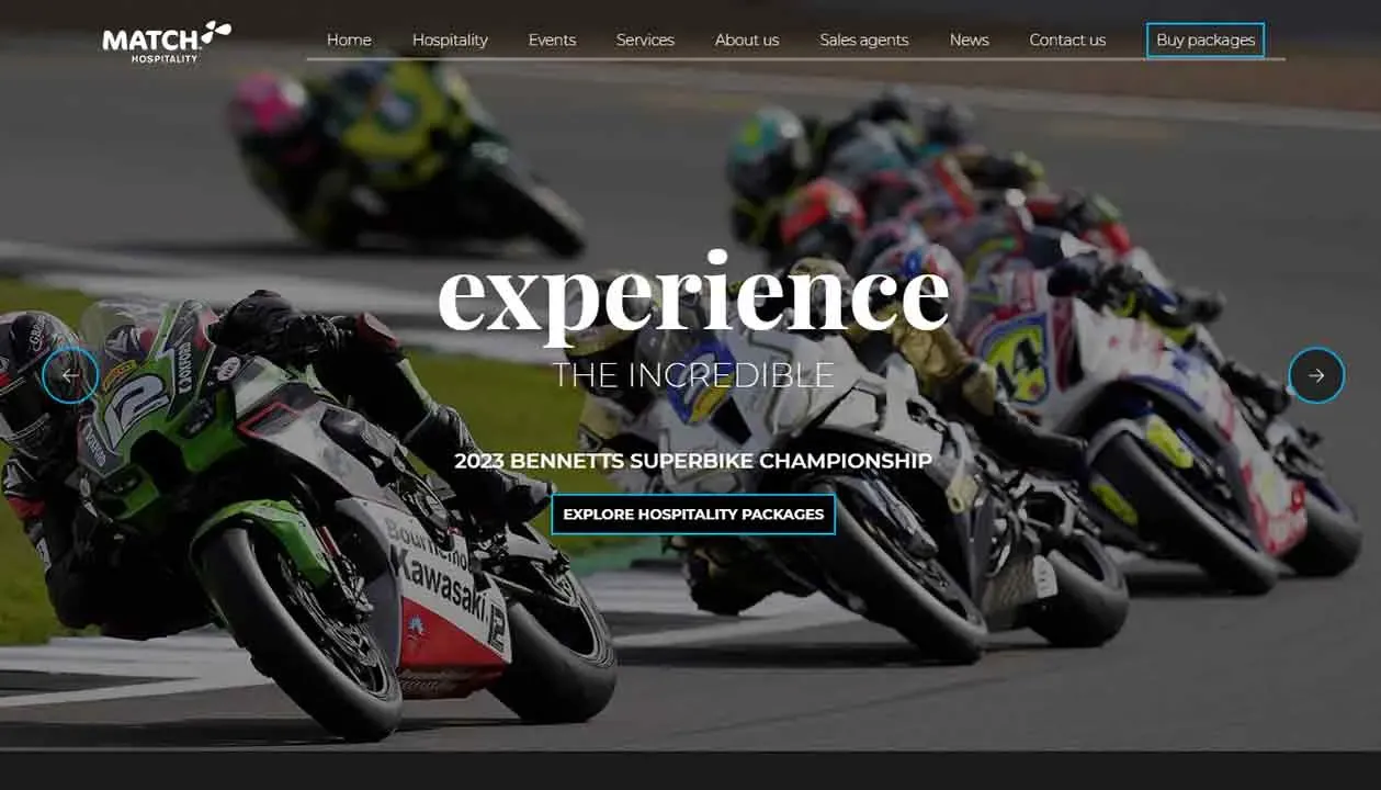 A dynamic scene capturing a group of professional motorcyclists leaned sharply as they race competitively along a curved track, emphasizing speed and precision at the 2023 Bennett's Superbike Championship.