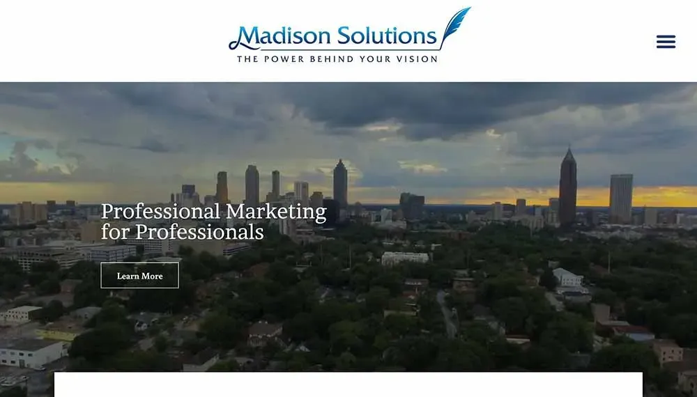 Aerial view of a city's skyline during sunset, featuring several tall buildings under a partly cloudy sky, with a banner reading "Madison Solutions: The Power Behind Your Vision" and a call to action button labeled "Learn More," emphasizing professional marketing for professionals.