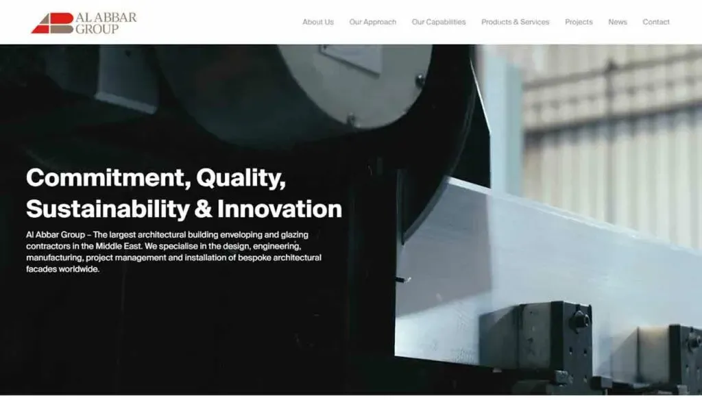 Architectural machinery at work in a modern industrial setting, showcasing the themes of commitment, quality, sustainability, and innovation, with a focus on design, engineering, and manufacturing in the building envelope sector.