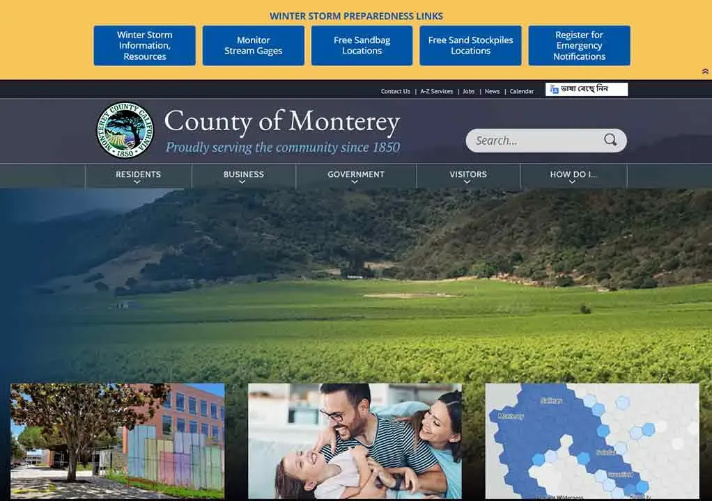 County of Monterey website homepage highlighting community service since 1850, features navigation links, an image of a picturesque landscape, and sections for residents, business, government, and visitors, with additional resources like winter storm preparedness prominently displayed.