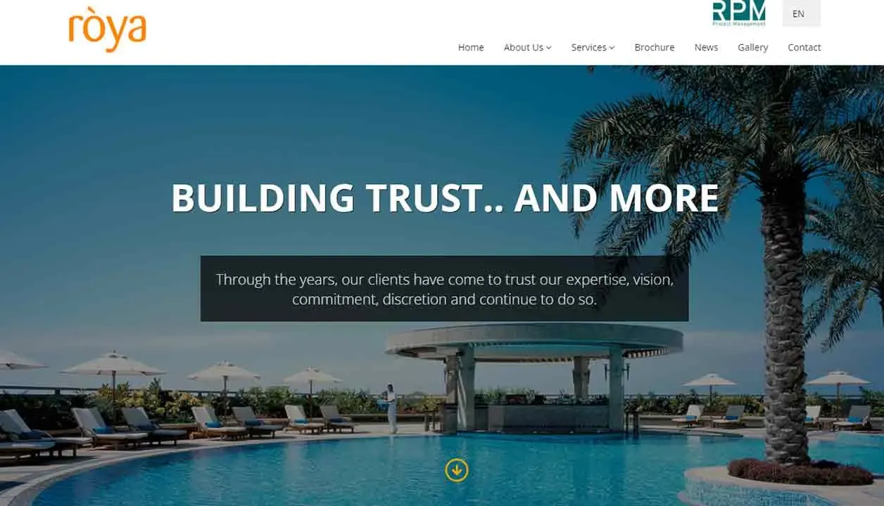 This image shows a luxurious outdoor swimming pool with a circular canopy structure, surrounded by sun loungers under clear blue skies, displaying the website header of a company with the slogan "Building Trust.. And More" and navigation menu options.