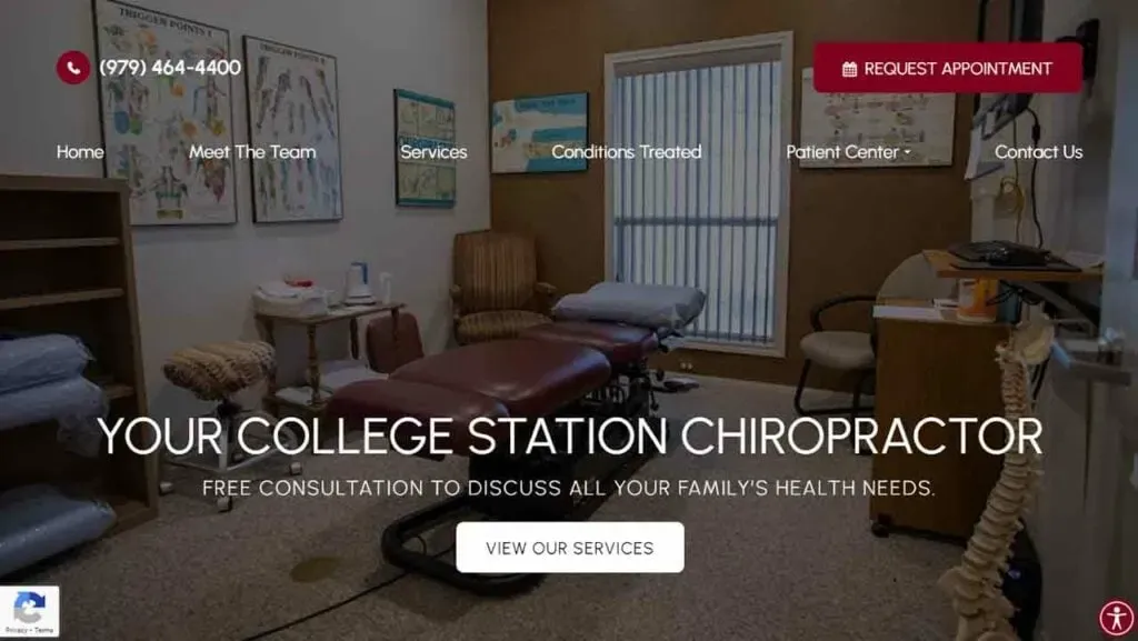 A chiropractic clinic room with a treatment table, anatomical charts on the walls, and informational brochures, offering chiropractic services and consultations.