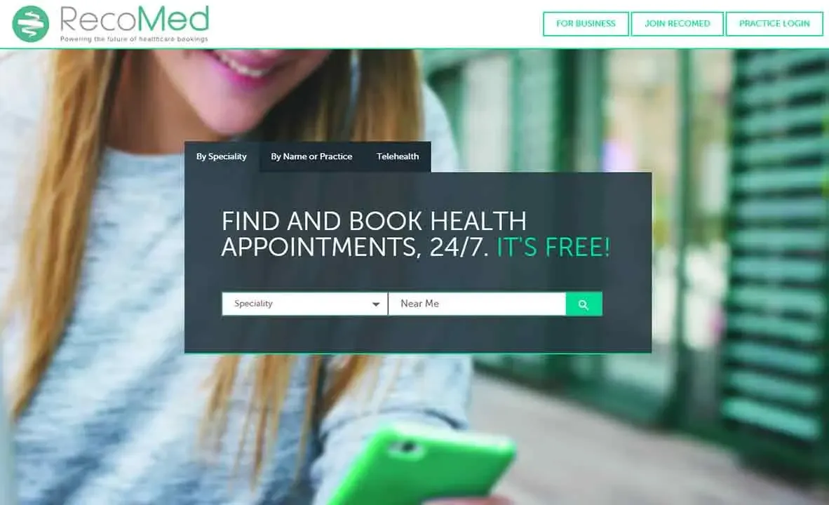 A woman holding a green smartphone uses the RecoMed healthcare booking website, featuring a search bar for finding and booking health appointments available 24/7, highlighted in a central overlay on the screen.