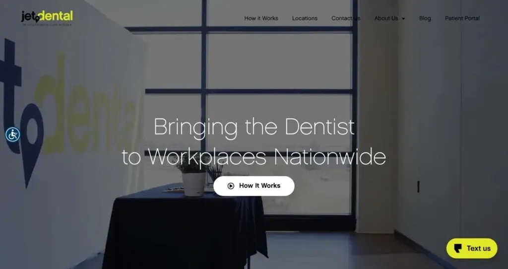The image shows a modern office space with a large, windowed backdrop and a sign that reads "Bringing the Dentist to Workplaces Nationwide," highlighting a dental service's nationwide workplace visits.