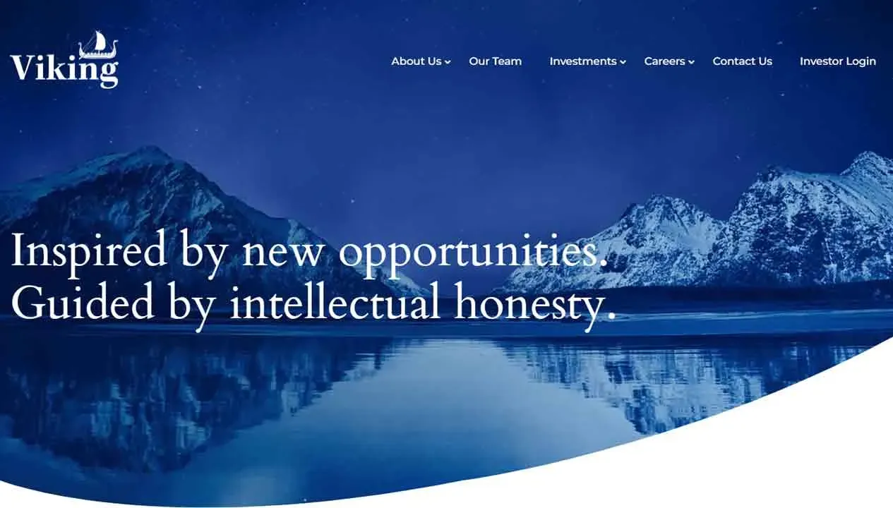 The homepage of Viking, featuring a serene lake reflecting snow-capped mountains at dusk, with the slogan "Inspired by new opportunities. Guided by intellectual honesty" in elegant white text over the image.