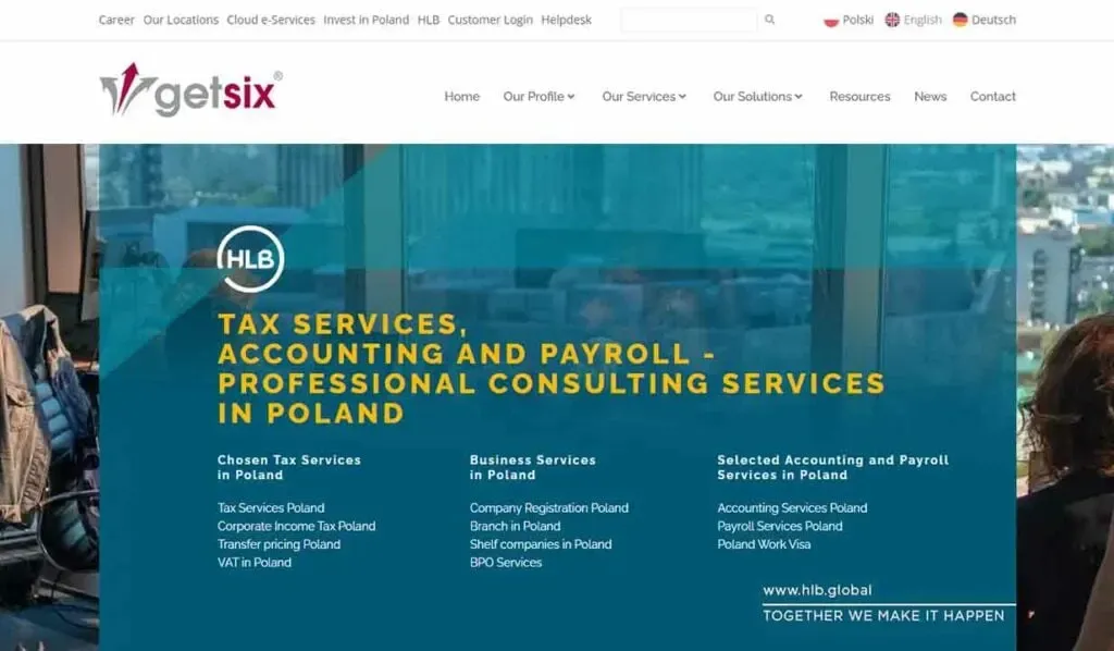 Homepage of a professional consulting firm showcasing tax, accounting, and payroll services in Poland, with menu options for career and customer support in the header.