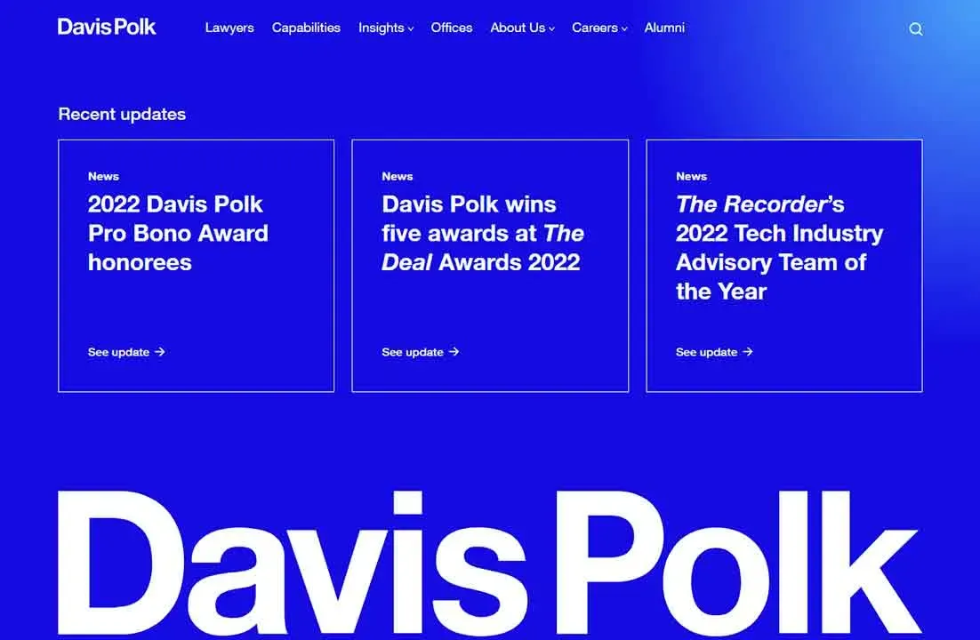 The image shows a website homepage for Davis Polk with a bold blue background, featuring three news update boxes highlighting awards and achievements from 2022, along with a navigation menu at the top.