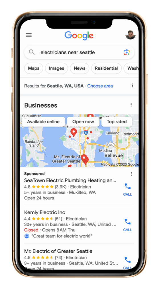 An example of a mobile search of "electricians near me" in Seattle.
